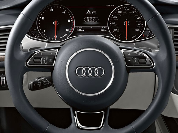 Audi A6 Limo's leather black alcantara steering wheel 